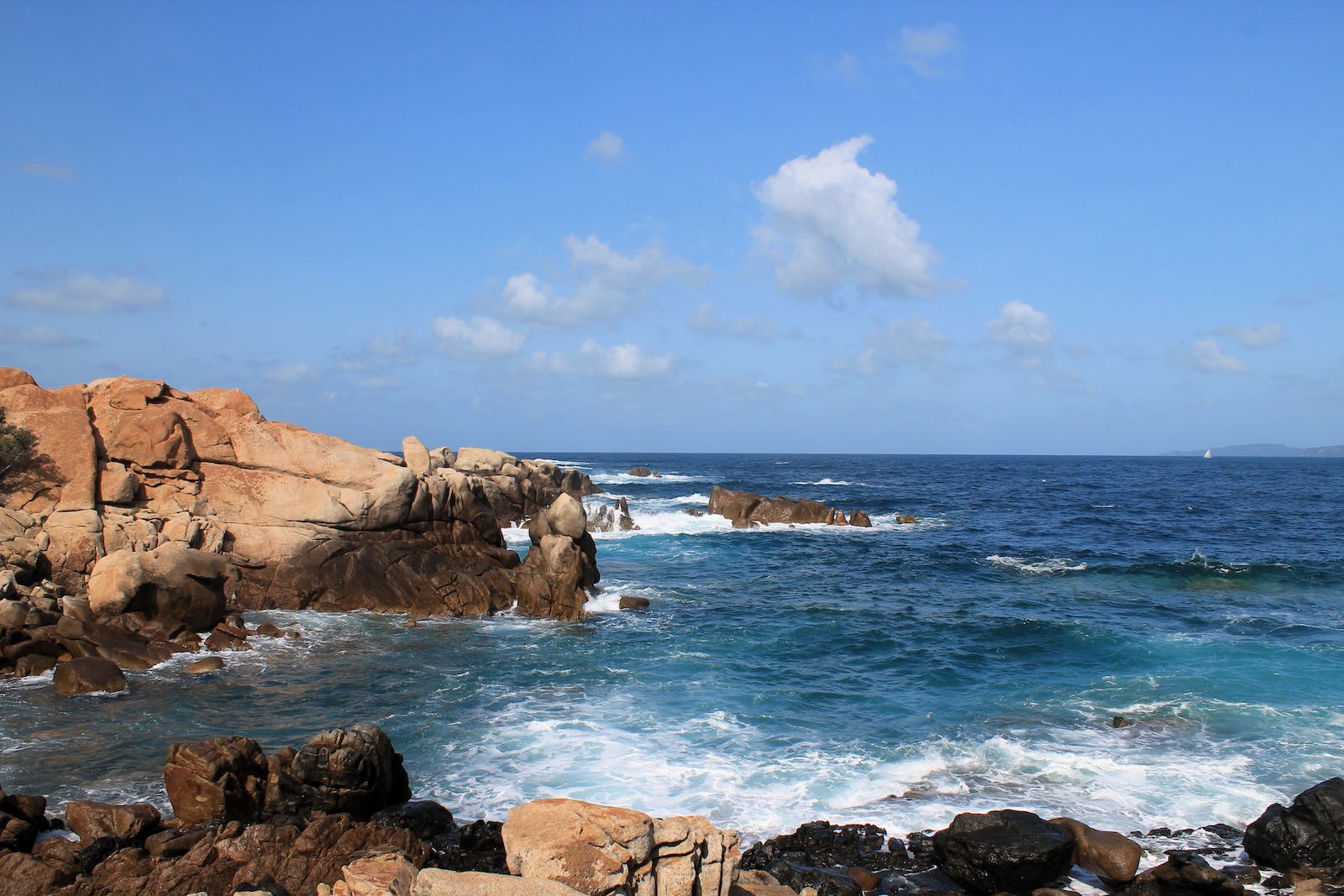 Rocks in Bay on Sea Shore